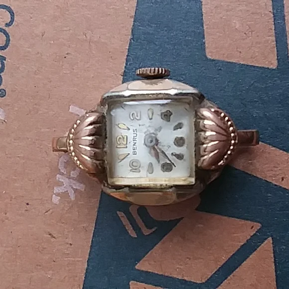 A vintage benrus 10k bezel watch face no band